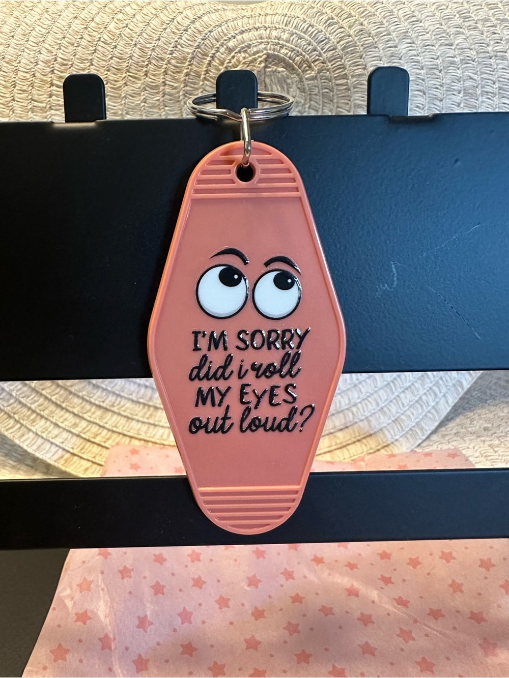 Pink Retro Motel Keychain with Eye Roll Graphic